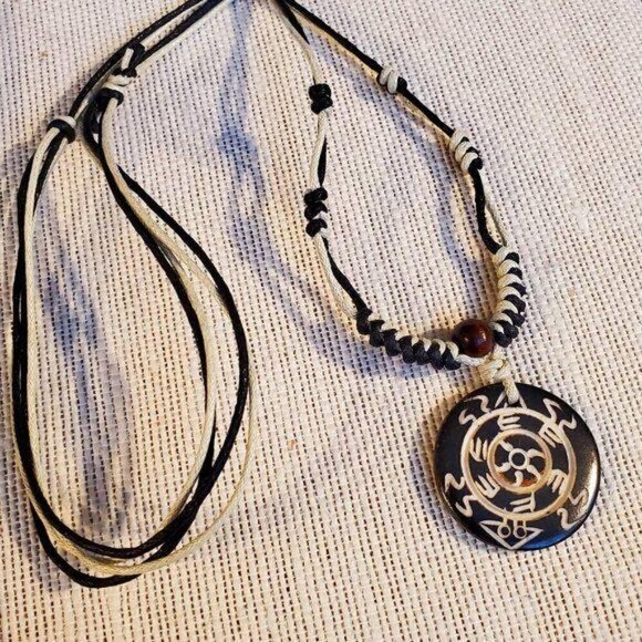 Handcrafted Tribal Bone Carved Symbols Necklace from India - Picture 1 of 6